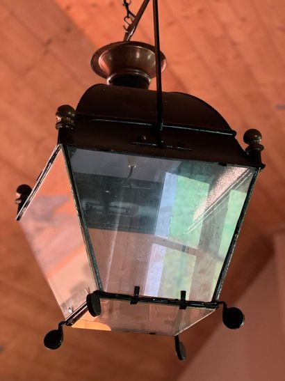 Pair of wrought iron, brass and glass lanterns,...