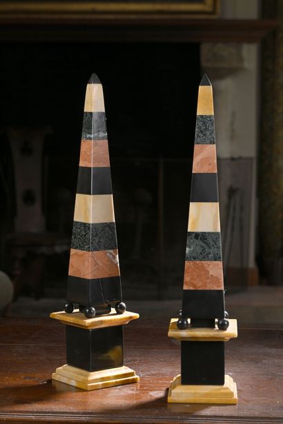 Pair of obelisks in colored marble.
H. 52...