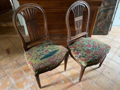 Suite of four Louis XVI-style natural wood...