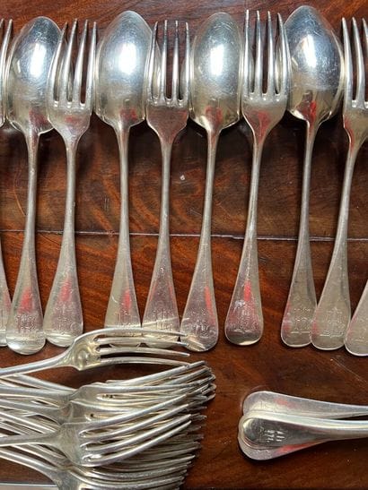 Thirteen large flatware sets and twelve large...