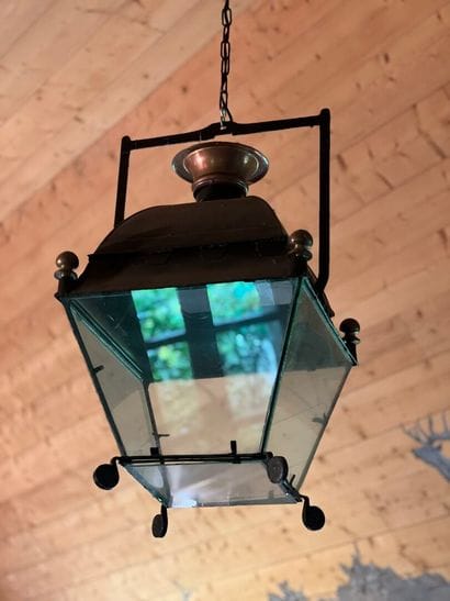 Pair of wrought iron, brass and glass lanterns,...