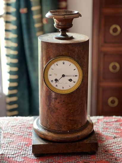 Restoration-period burr veneer column clock.
Movement...