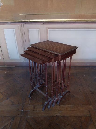 Suite of four nesting tables in marquetry,...