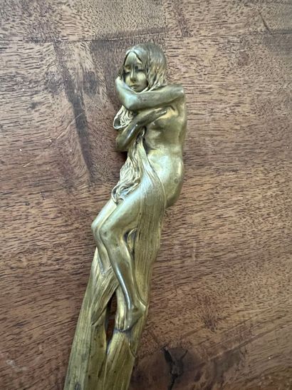 Chased bronze paper cup, circa 1900
Decorated...