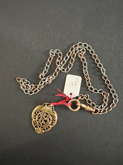 Lot comprising a gold chain and a medal bearing...