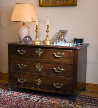 Mahogany and mahogany veneer chest of drawers,...