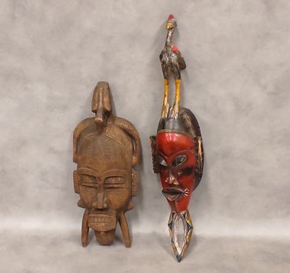 A set of 7 modern wooden masks including...