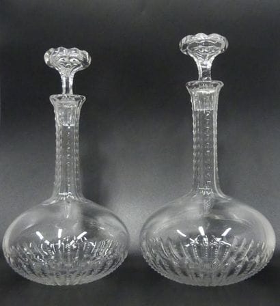 Two crystal decanters of the same model 
with...