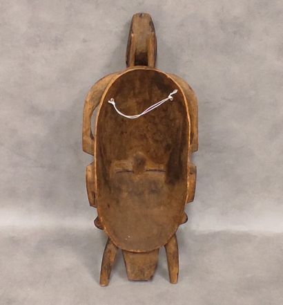 A set of 7 modern wooden masks including...