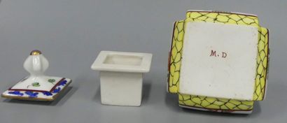 a porcelain inkwell with floral decoration
with...