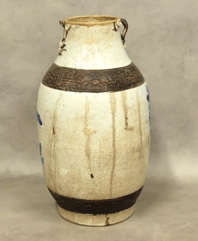 A set of two Nanking ceramic vases with Asian...