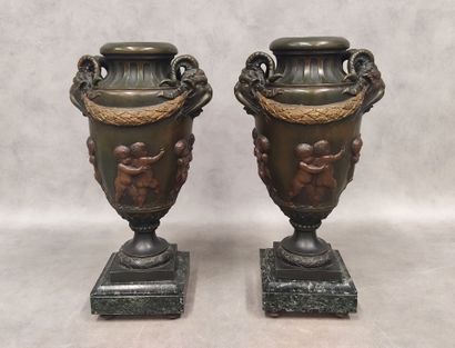 A pair of Regula urn vases decorated with...