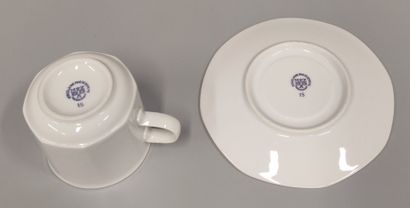 Six large coffee cups and saucers in white...