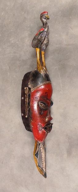 A set of 7 modern wooden masks including...