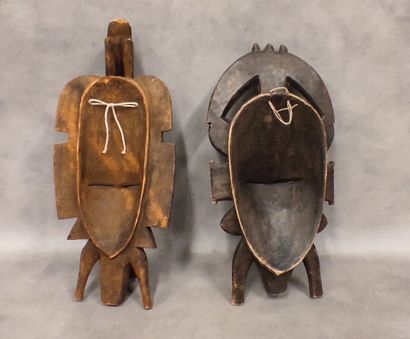 A set of 7 modern wooden masks including...