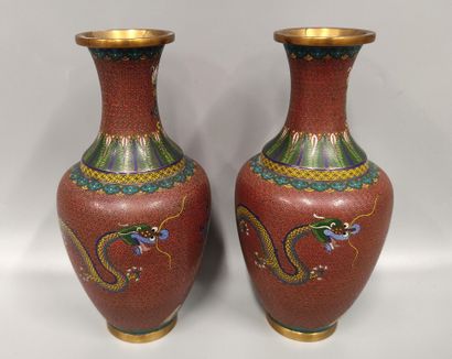 A pair of cloisonné vases with dragon design
H...