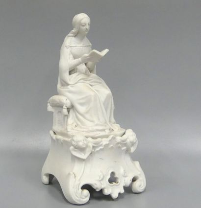 A pair of bookends in patinated plaster:...