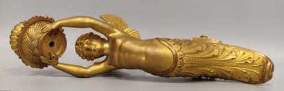 A pair of gilt bronze and chased sconces
depicting...
