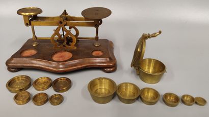 A brass set: 
A small changer scale with...