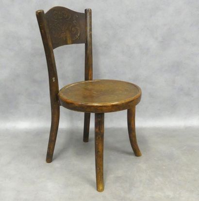 A small bistro-style children's chair in...