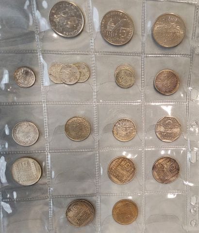 an album of about 175 coins from all countries,...