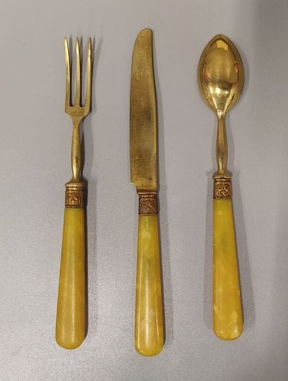 Christofle: a set of nine metal coffee spoons...