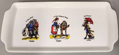 A set of seven white porcelain pieces decorated...