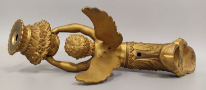 A pair of gilt bronze and chased sconces
depicting...