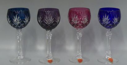 A set of four coloured cut-crystal glass...