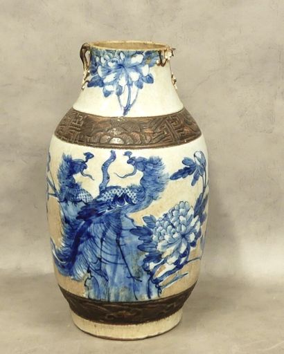 A set of two Nanking ceramic vases with Asian...