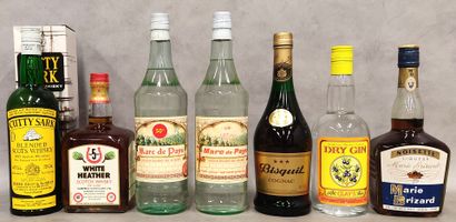 Lot of seven bottles of alcohol:
Two bottles...