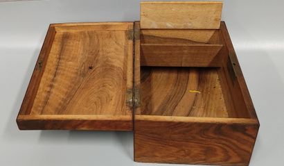 A burrwood box, the lid covered with leather
a...