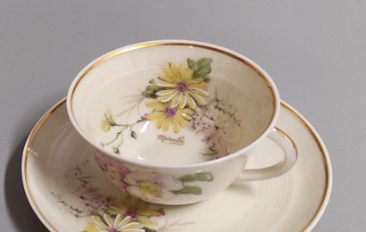 An 84-piece dinner service in Limoges porcelain
marked...