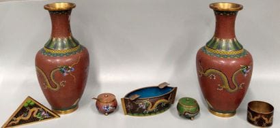 A pair of cloisonné vases with dragon design
H...