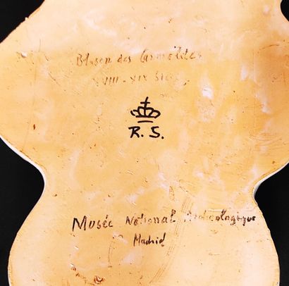 An earthenware stoup decorated with the Carmelite...