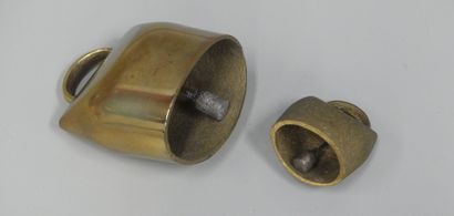 Lot: two small brass goat bells
the small...