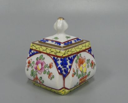 a porcelain inkwell with floral decoration
with...