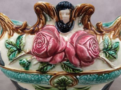 Onnaing : A jardiniere in barbotine 
decorated...