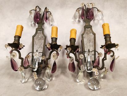 A pair of bronze sconces with medal patina...