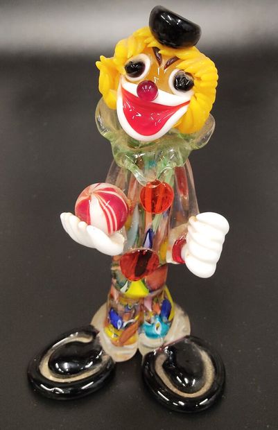 Murano: a juggling clown in multicolored...