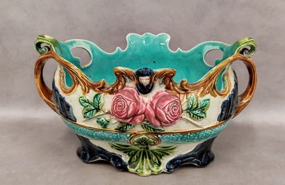 Onnaing : A jardiniere in barbotine 
decorated...