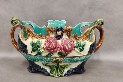 Onnaing : A jardiniere in barbotine 
decorated...