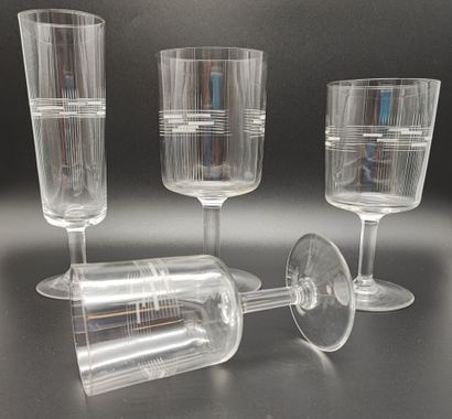 A set of glasses engraved with geometric...