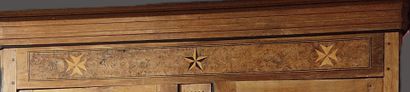 A two-door Transition-style cabinet decorated...