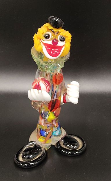 Murano: a juggling clown in multicolored...