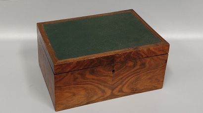 A burrwood box, the lid covered with leather
a...