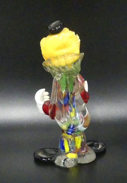 Murano: a juggling clown in multicolored...