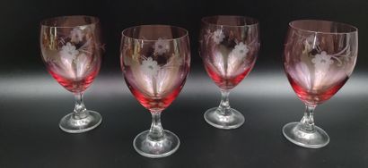Set of four engraved pink-tinted crystal...
