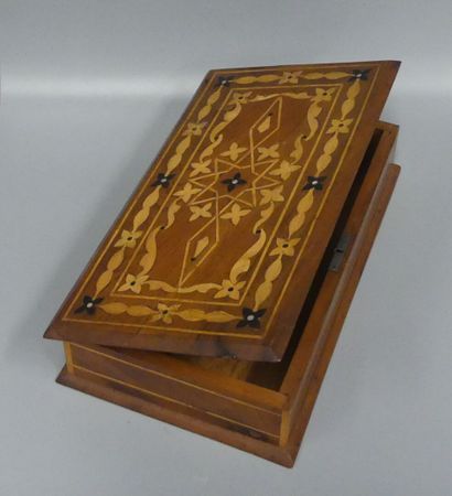 Two wooden boxes,
one with a lid decorated...