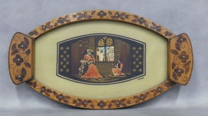 An oval Art Deco wooden tray signed Géronde
decorated...